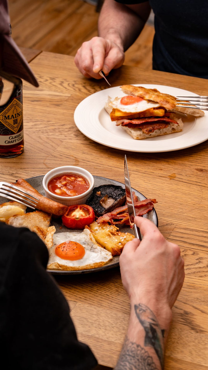 Breakfast sandwich being cut open at The Focacceria, Upstairs at House Proud Furniture on Boucher Road Belfast